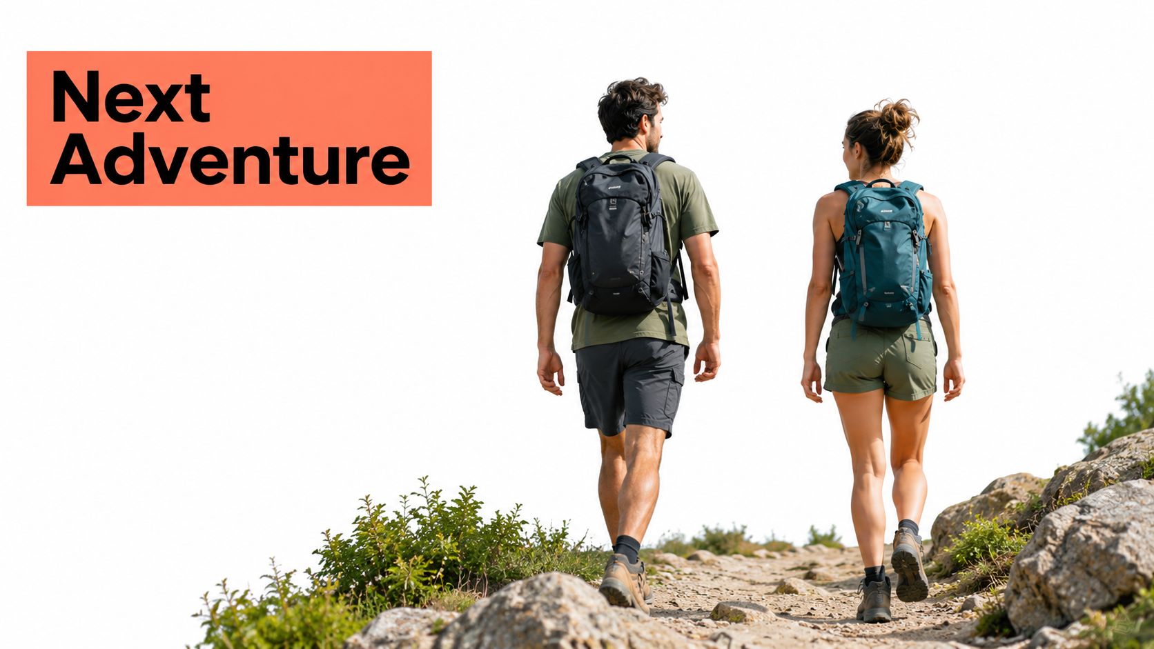 A man and a woman wearing backpacks hiking on a rocky mountain path on a sunny day.