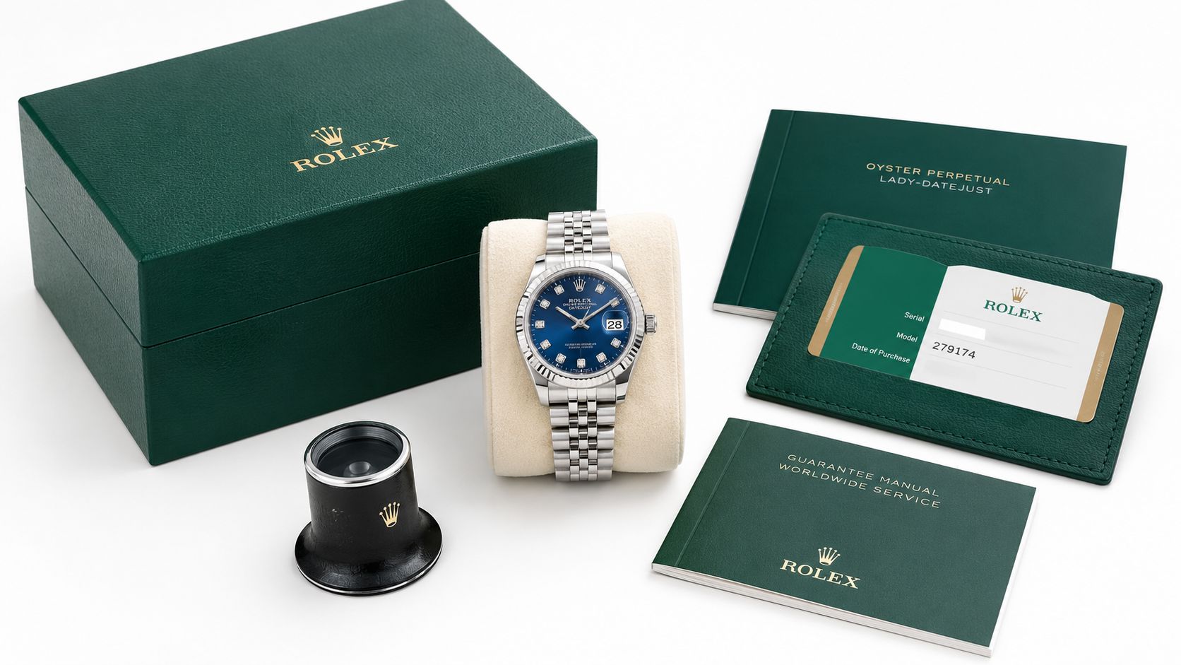 Rolex Lady-Datejust with a blue dial presented with its green box and accessories