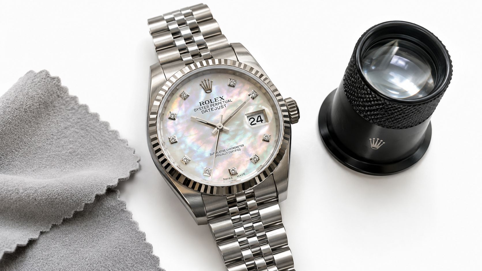 A luxurious Rolex Datejust watch featuring a shimmering mother of pearl dial with diamond hour markers.
