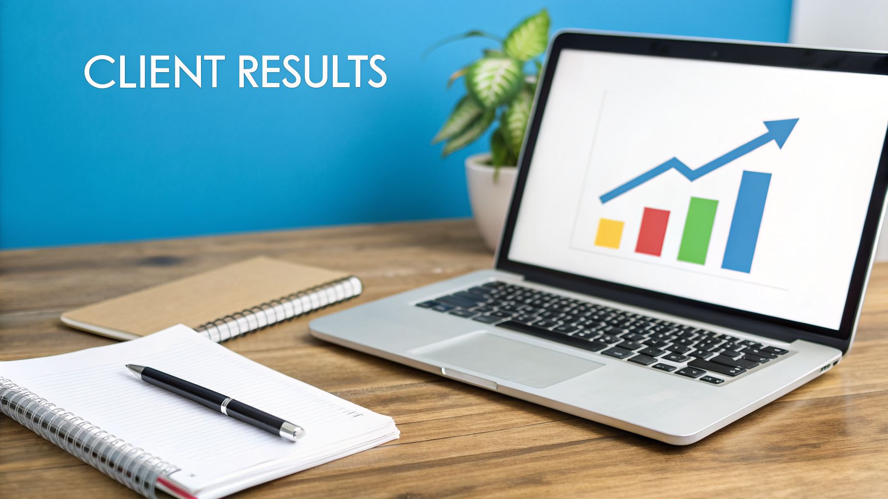 A laptop displaying client results with an upward trend graph, next to notebooks and a pen.