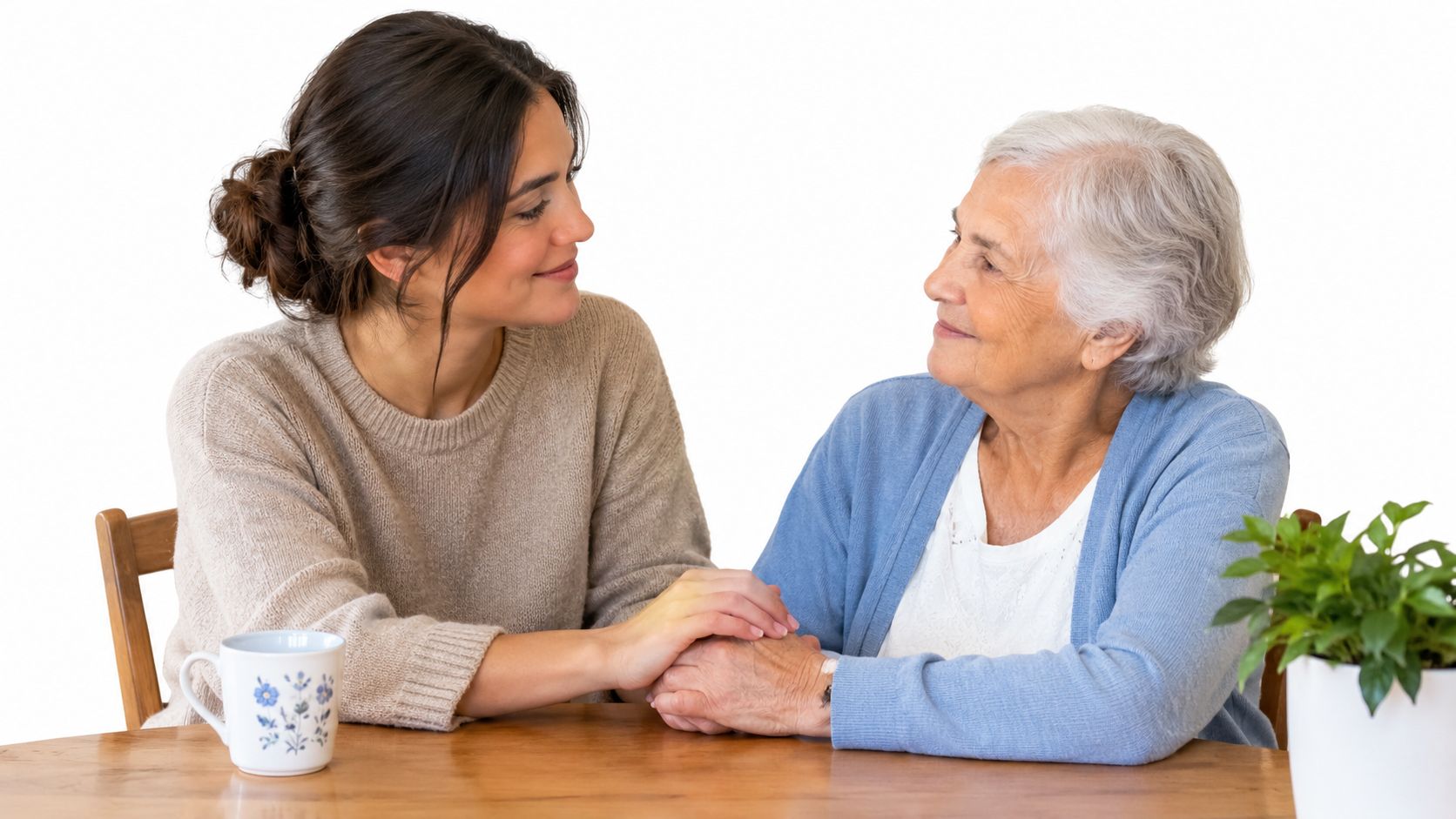 A young woman affectionately holding hands with an elderly woman, providing support and compassionate dementia care.