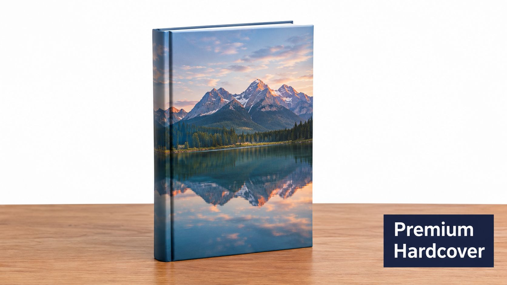 A premium hardcover book featuring a beautiful landscape image of mountains and lake reflections standing upright.