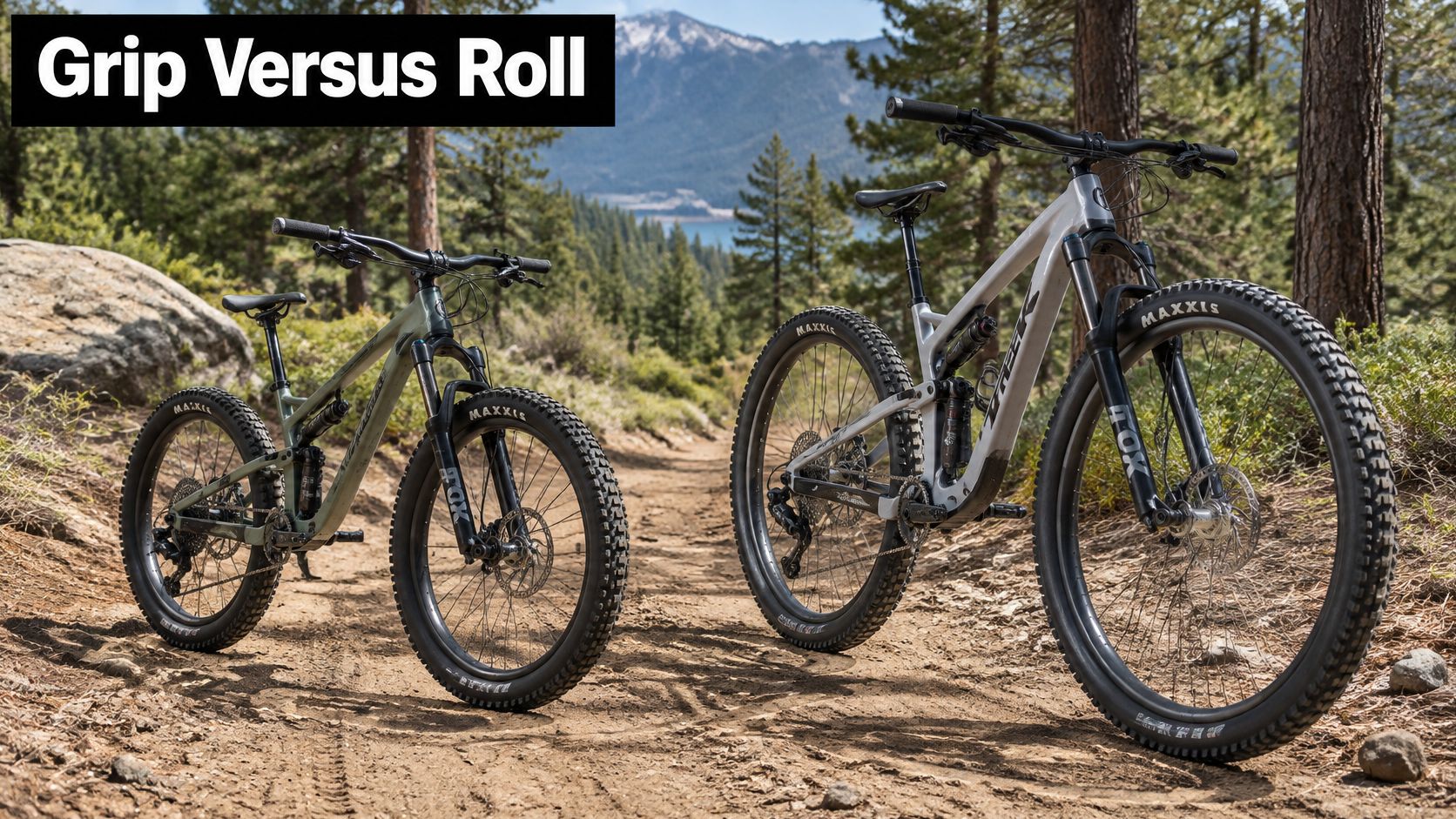 Two full suspension mountain bikes parked on a dirt trail in a forested mountain landscape.