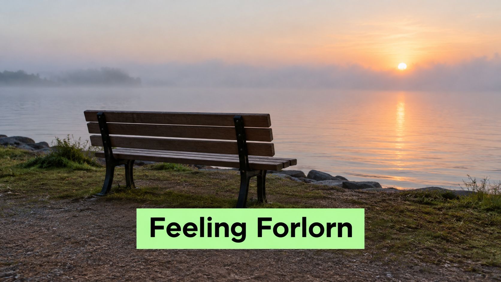 A lonely wooden park bench overlooking a serene, misty lake during a peaceful sunset at dawn.