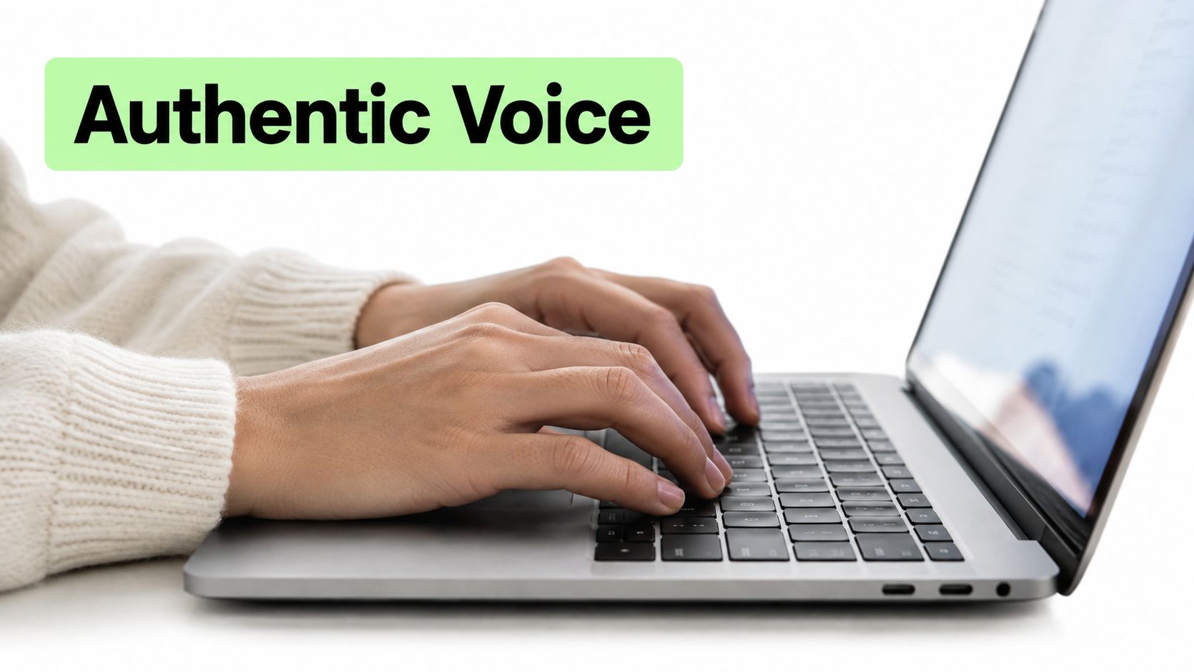 A close-up view of a person typing on a silver laptop with the text Authentic Voice overlaid.