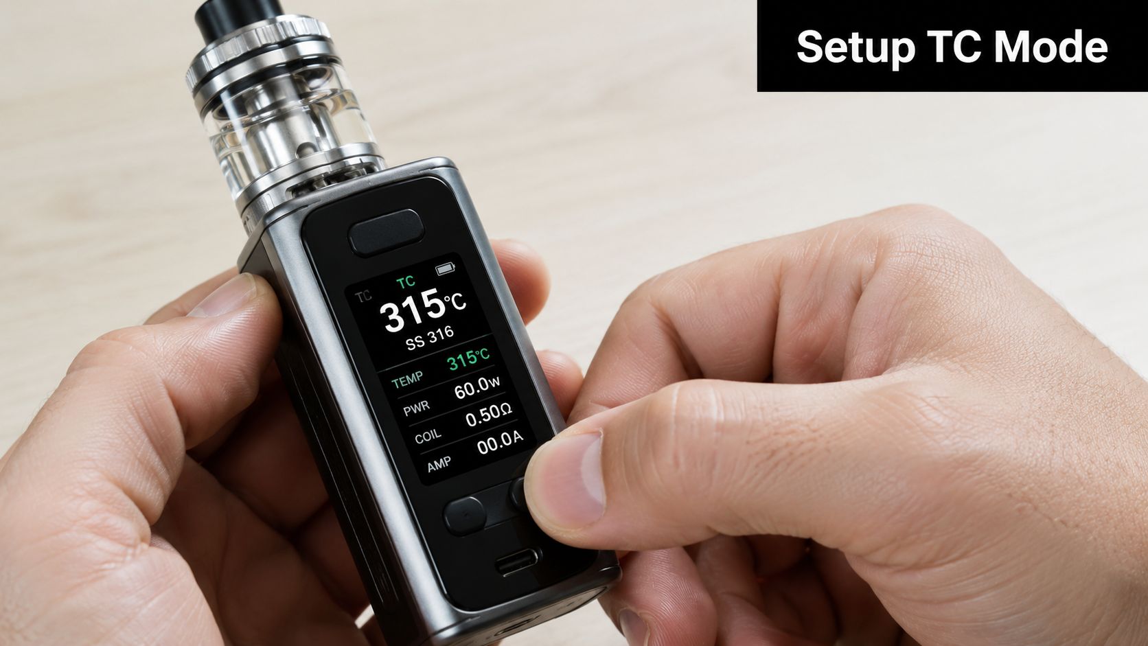 A person adjusting the settings on a vaping device set to temperature control mode in a studio setting.