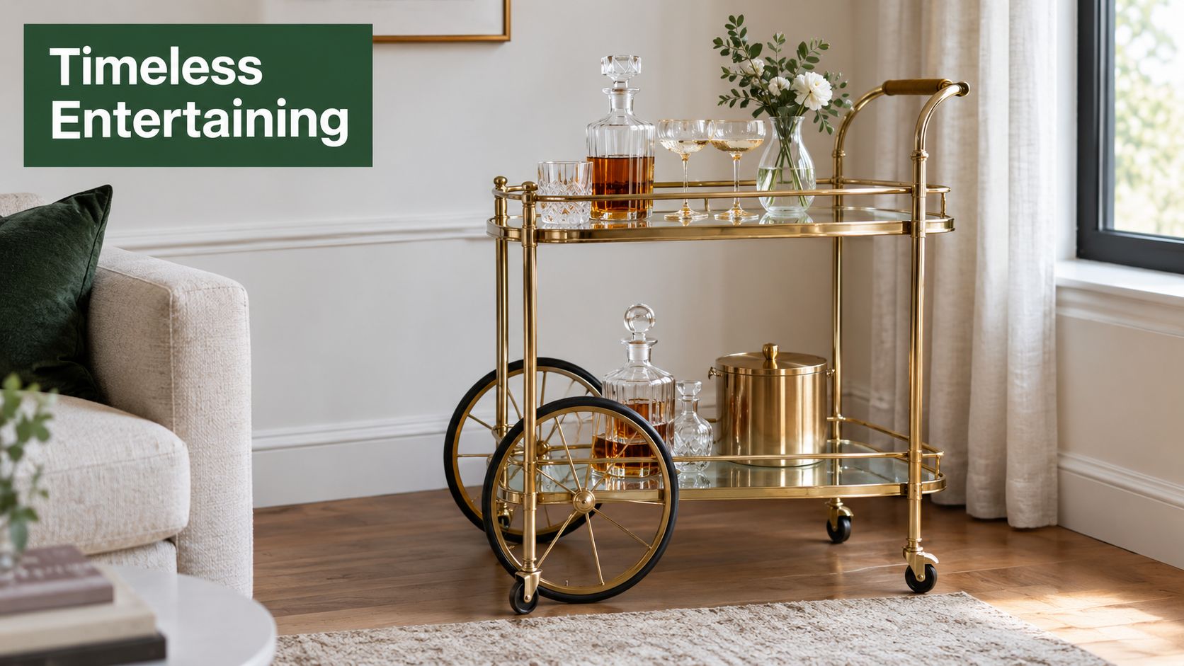 A luxurious gold metal bar cart styled with crystal decanters, glassware, and flowers in a bright room.