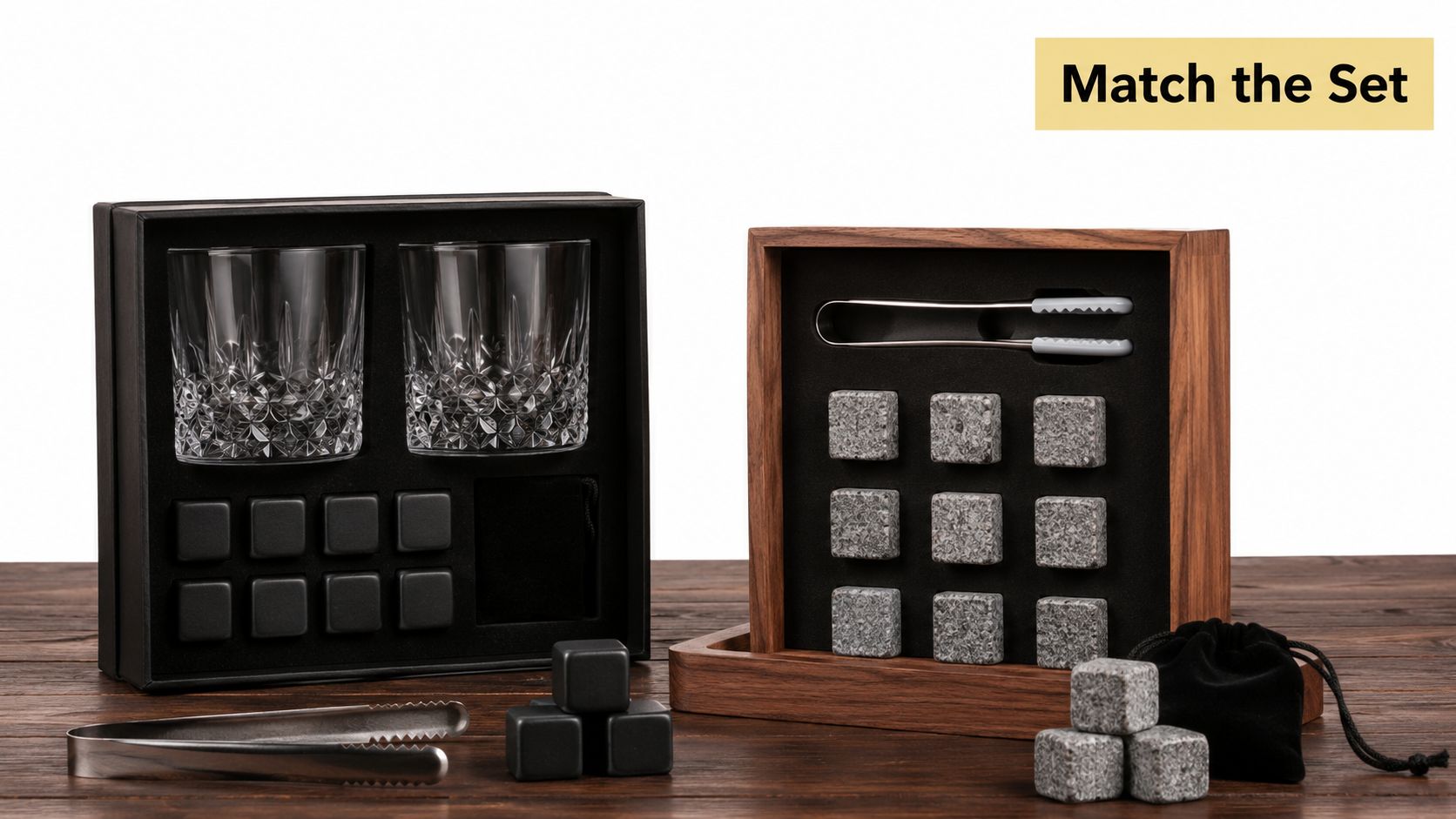 A whiskey stones gift set for men featuring two crystal glasses, stainless steel tongs, and granite cooling cubes.