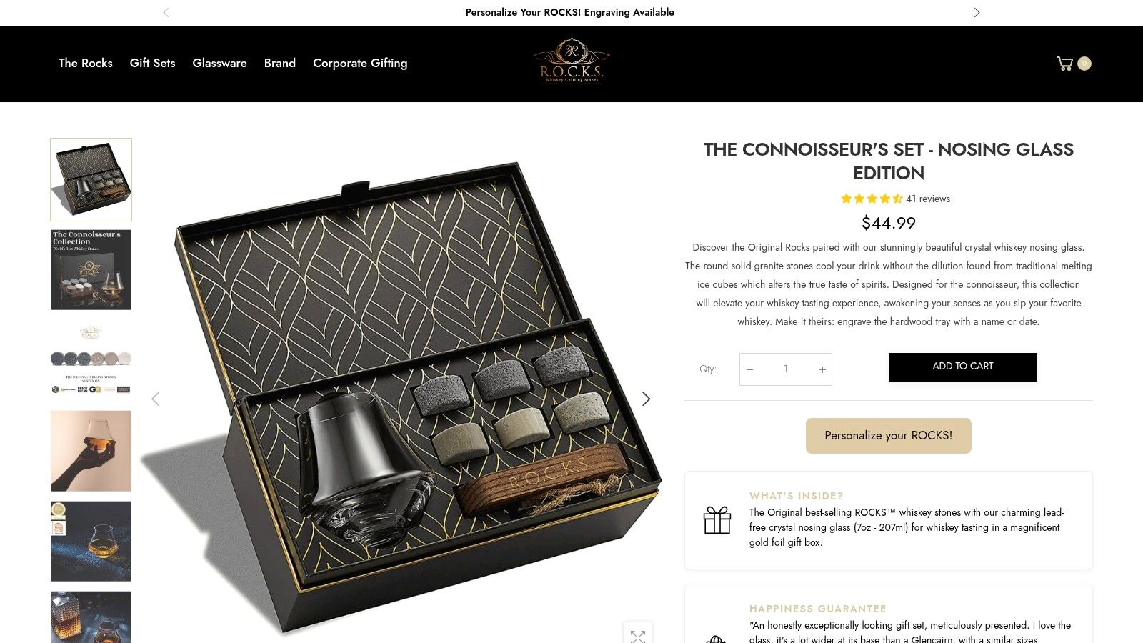 The Connoisseur's Set featuring whiskey chilling stones and crystal nosing glass in elegant packaging.