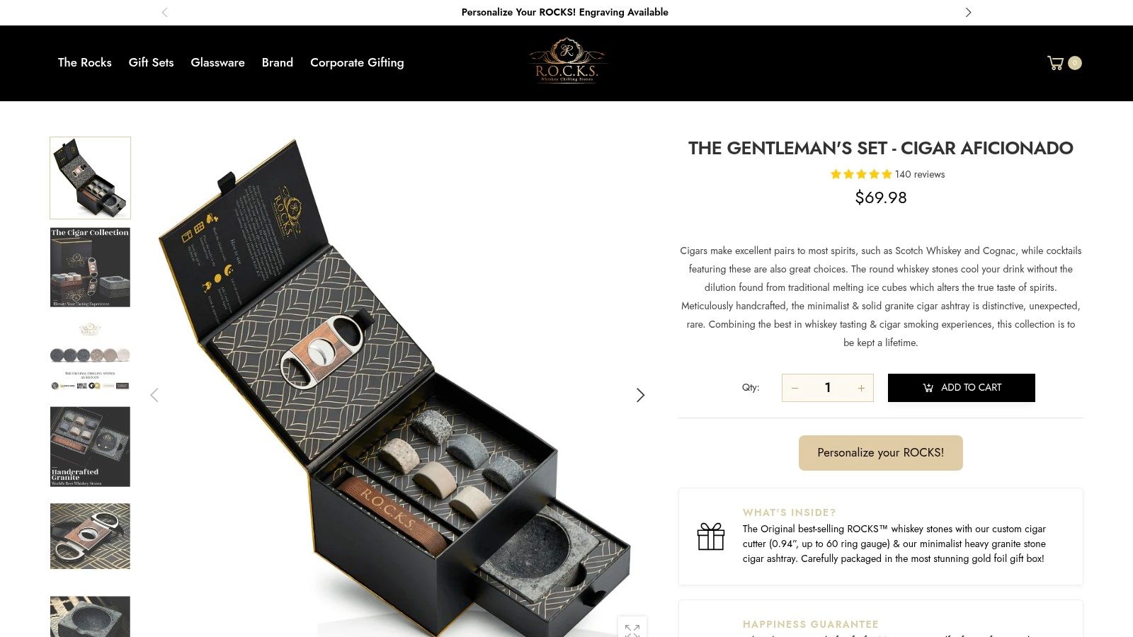 The Gentleman's Set with whiskey chilling stones, cigar cutter, ashtray, and whiskey stones in elegant packaging.
