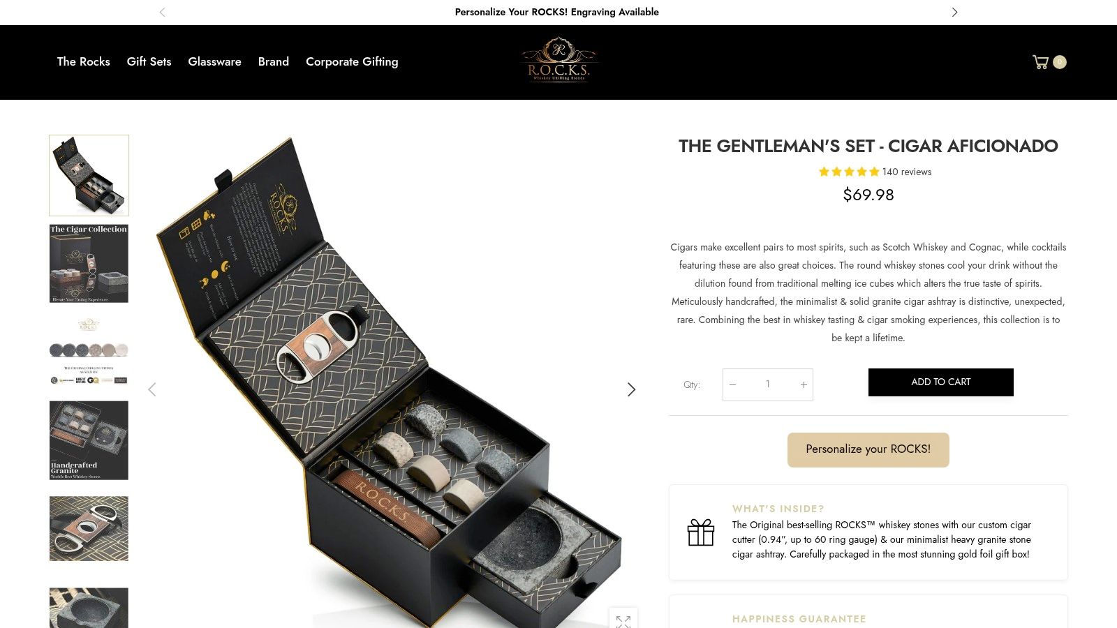 The Gentleman's Set with whiskey chilling stones, cigar cutter, ashtray, and whiskey stones in elegant packaging.