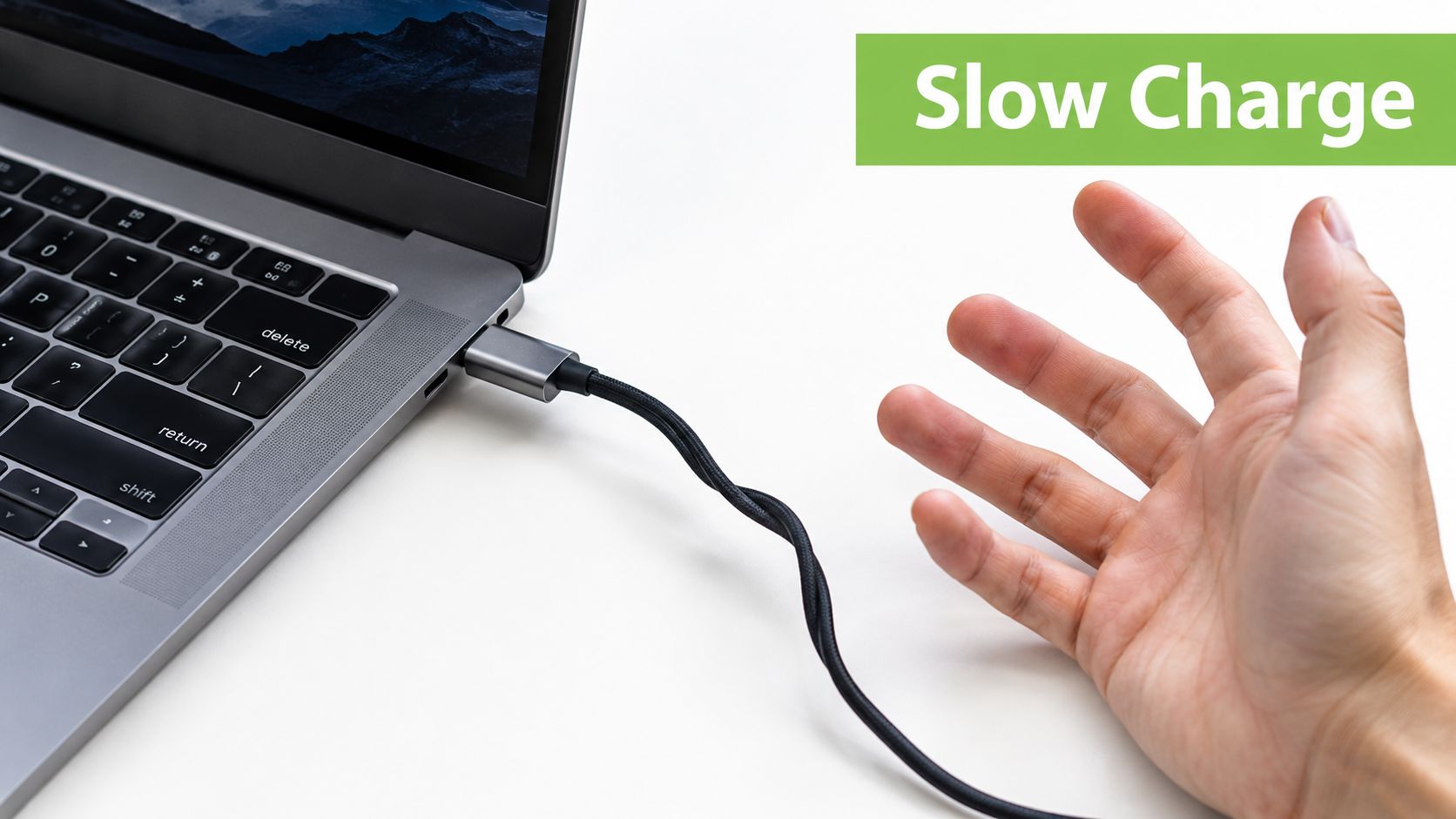 A hand gesture directed towards a USB-C cable plugged into a laptop, with a slow charge label.