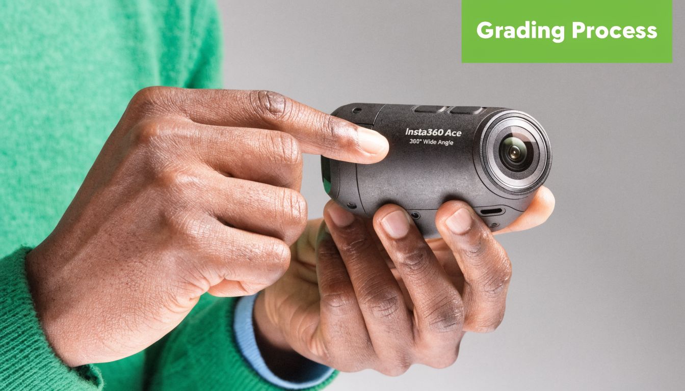 A person holding a black Insta360 Ace 360 wide angle action camera during a product grading process.