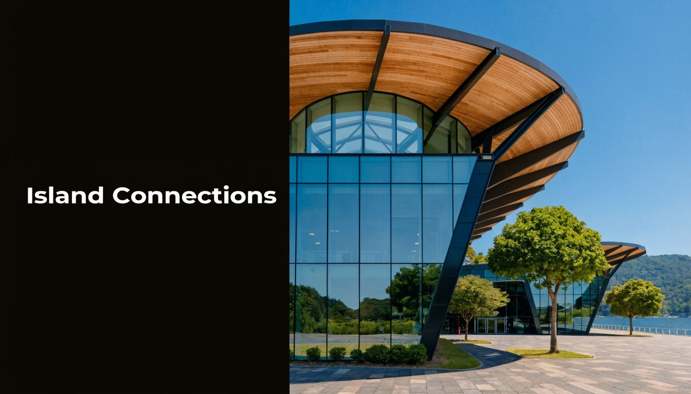 A modern glass building with a curved wooden roof next to a scenic waterfront on a sunny day.