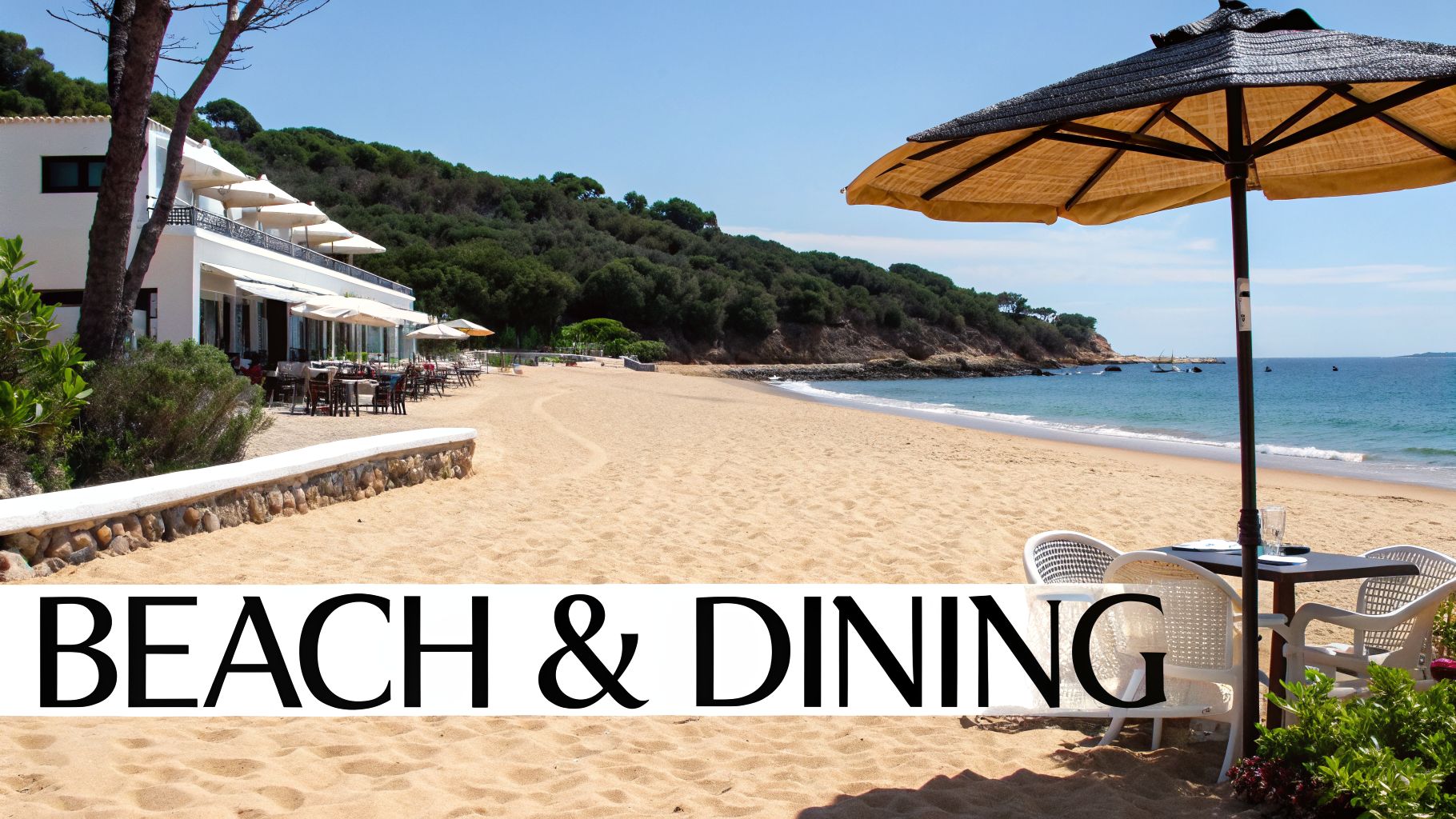 A picturesque sandy beach with an outdoor restaurant and a dining area under a beach umbrella.