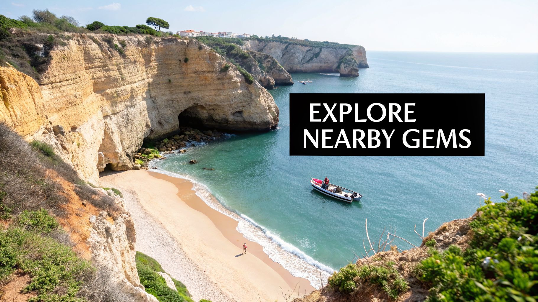 Beautiful view of Praia do Carvalho beach in Algarve, Portugal, with towering golden cliffs and clear blue waters.