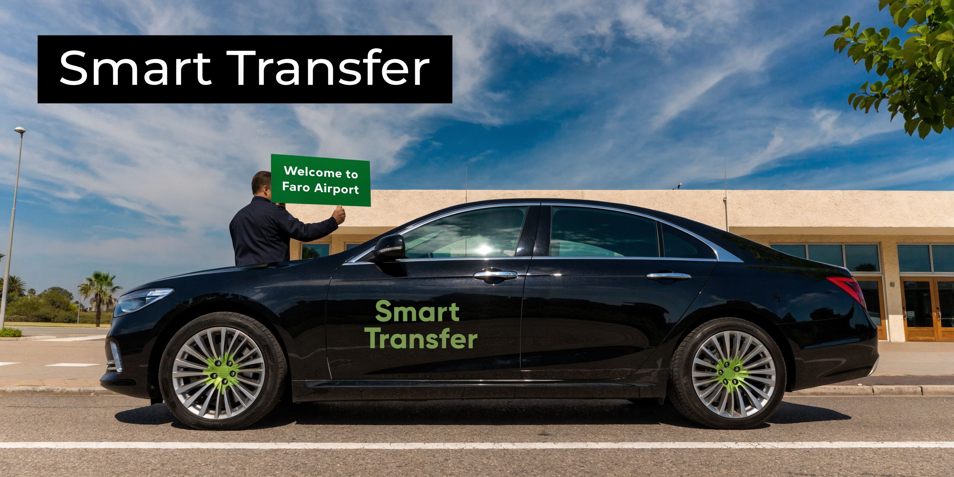 A professional driver standing next to a black luxury car with a Welcome to Faro Airport sign.