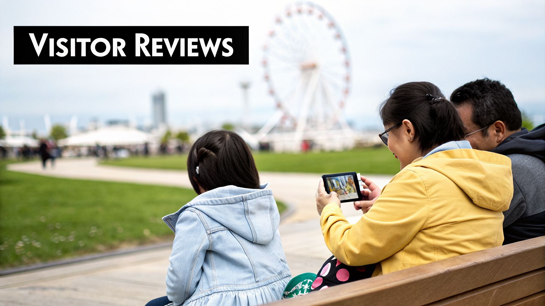 People on a bench viewing a device, with a Ferris wheel in the background and 'VISITOR REVIEWS' text.