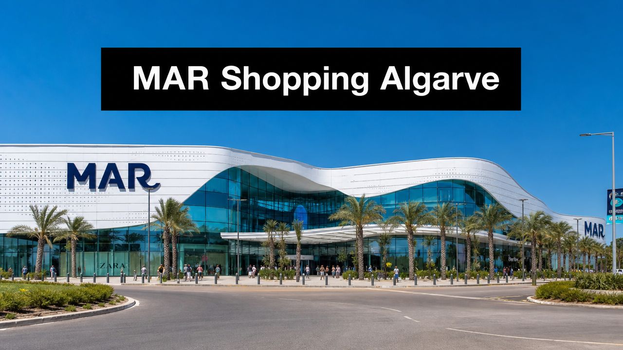 The modern exterior of MAR Shopping Algarve, a large shopping center in Loulé, Portugal, on a sunny day.