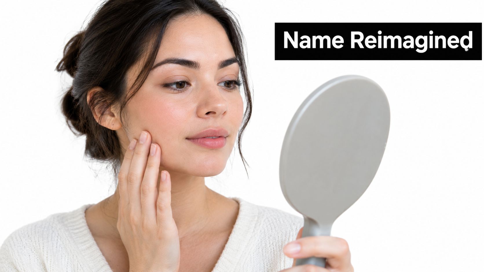 A woman looks at her reflection in a hand mirror, contemplating her personal brand and online identity.