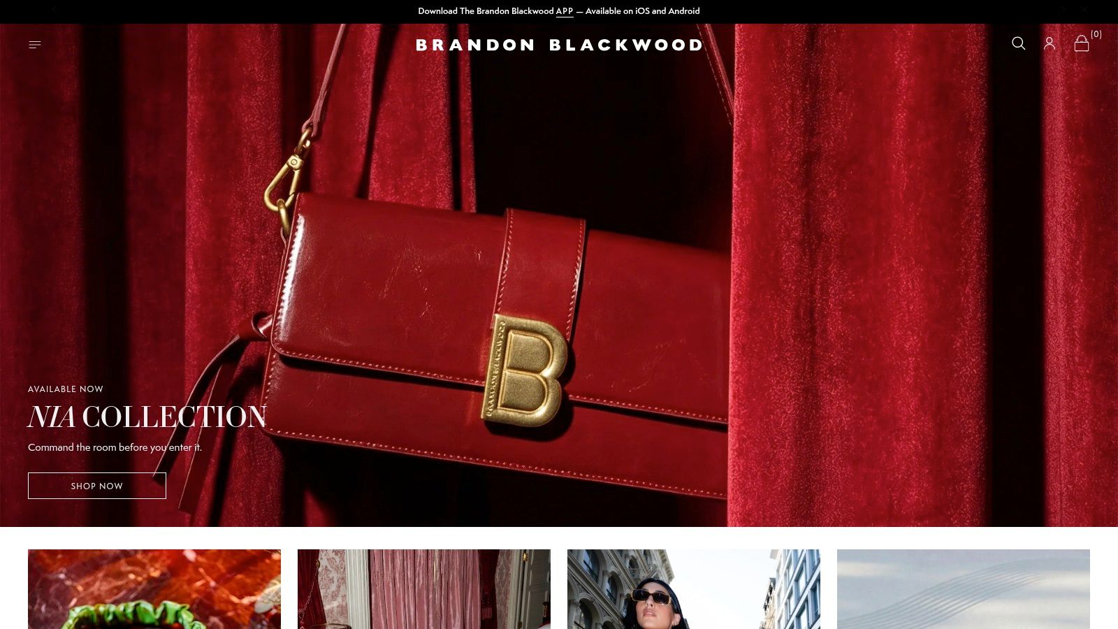 A vibrant red Brandon Blackwood handbag on display