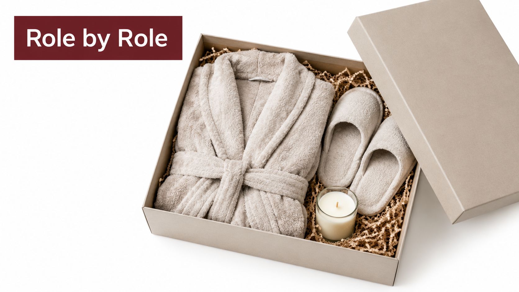 A luxurious spa gift box containing a plush bathrobe, soft slippers, and a scented candle.