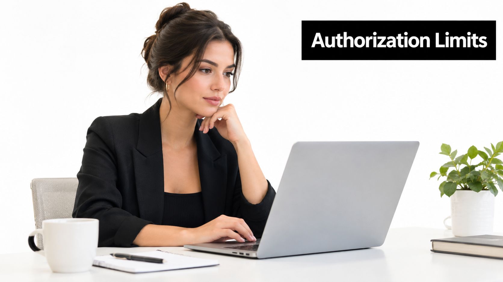 A professional woman in a blazer working on a laptop at a desk with authorization limits text.