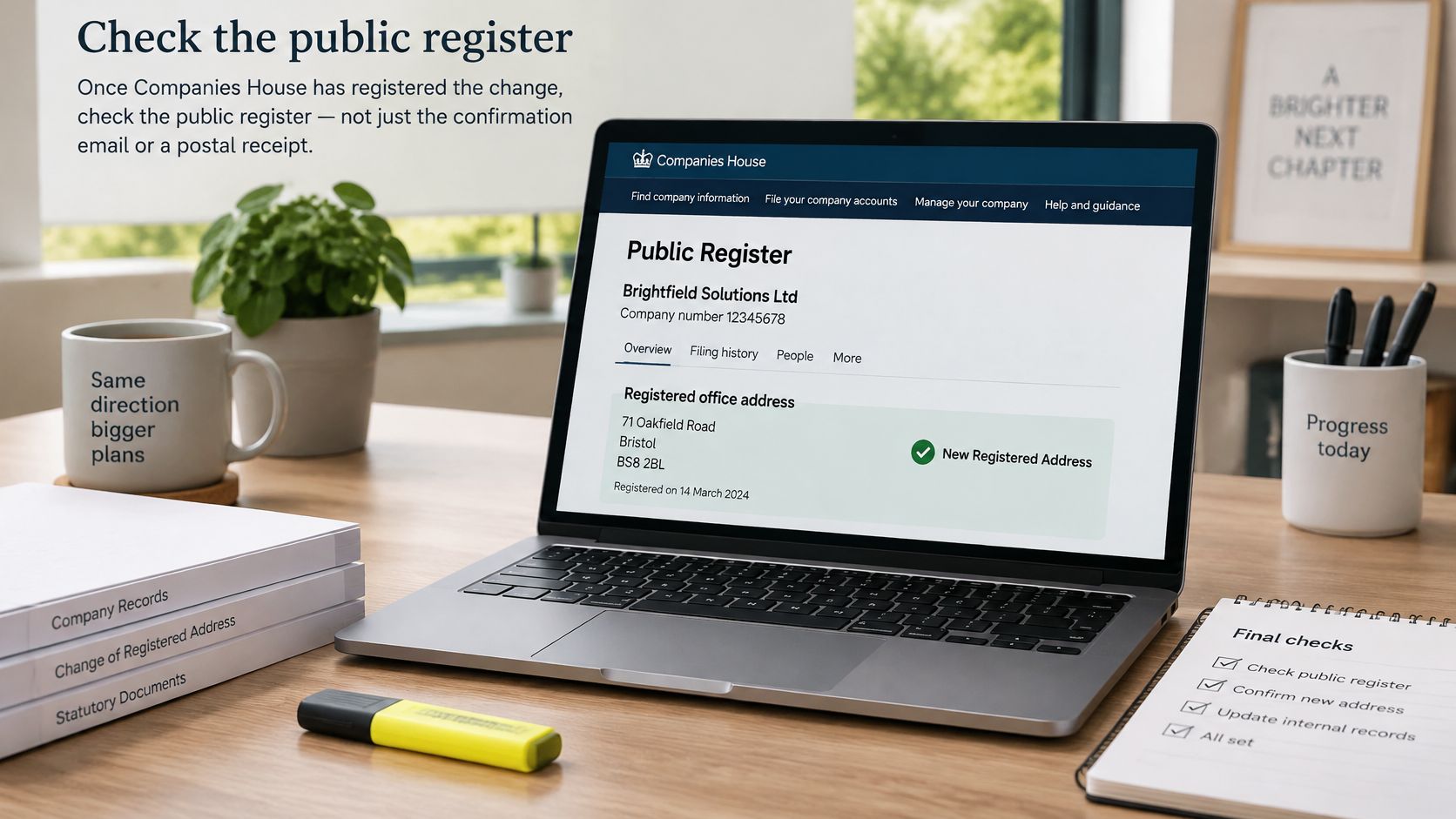 A laptop screen displaying a Companies House public register entry confirming an updated registered office address.