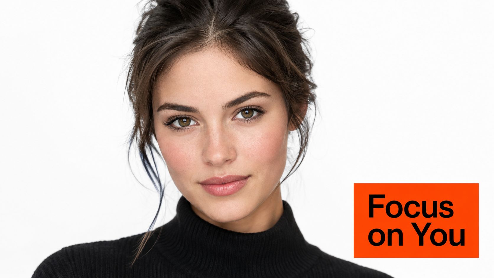 A professional portrait of a woman with brown hair wearing a black turtleneck against white background.