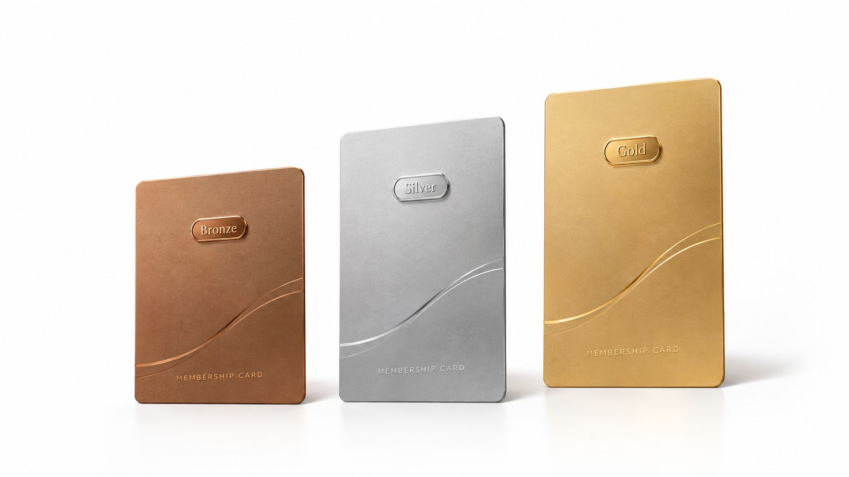 Three premium metal loyalty membership cards displayed in bronze, silver, and gold tiers on white background.