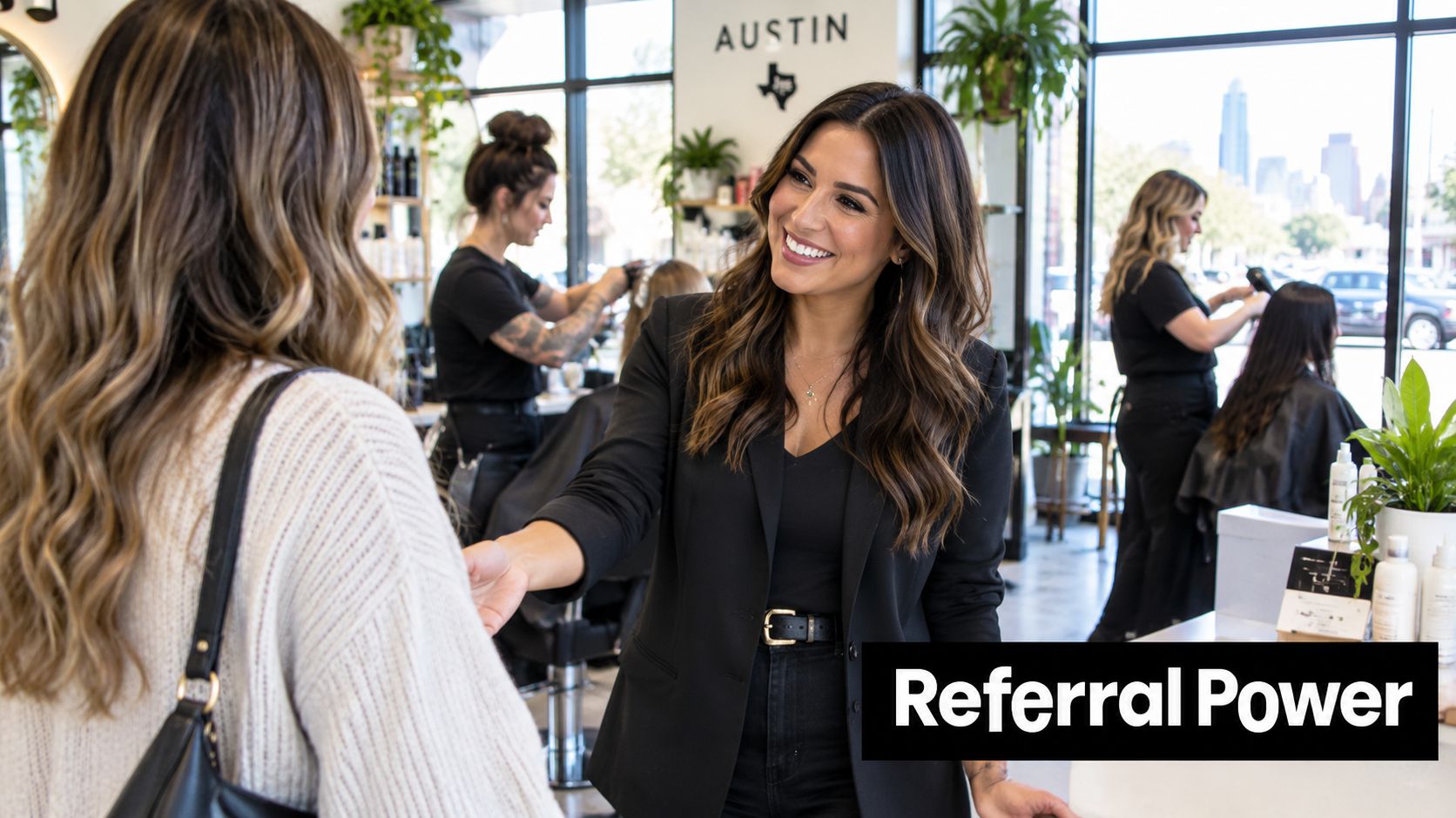 A friendly hair salon owner warmly greeting a client at the reception desk in a salon.