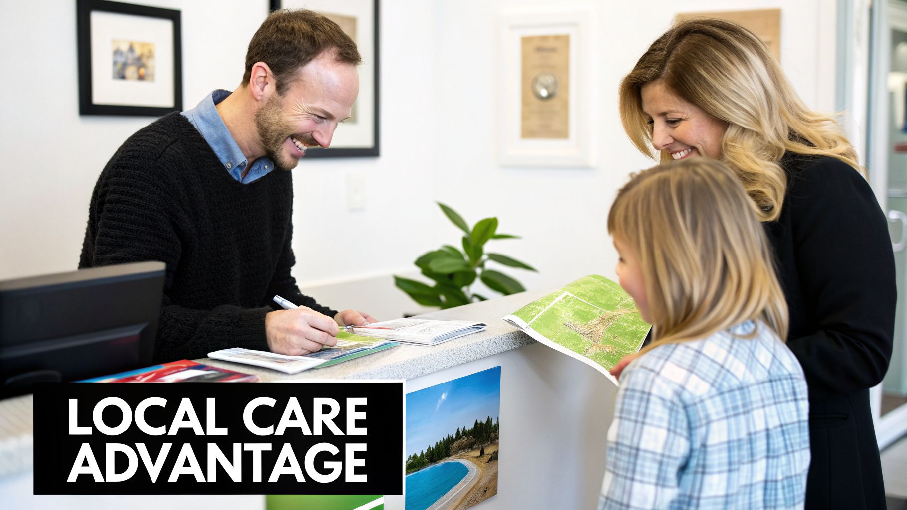 A smiling man assists a woman and child holding a map at a bright service counter.