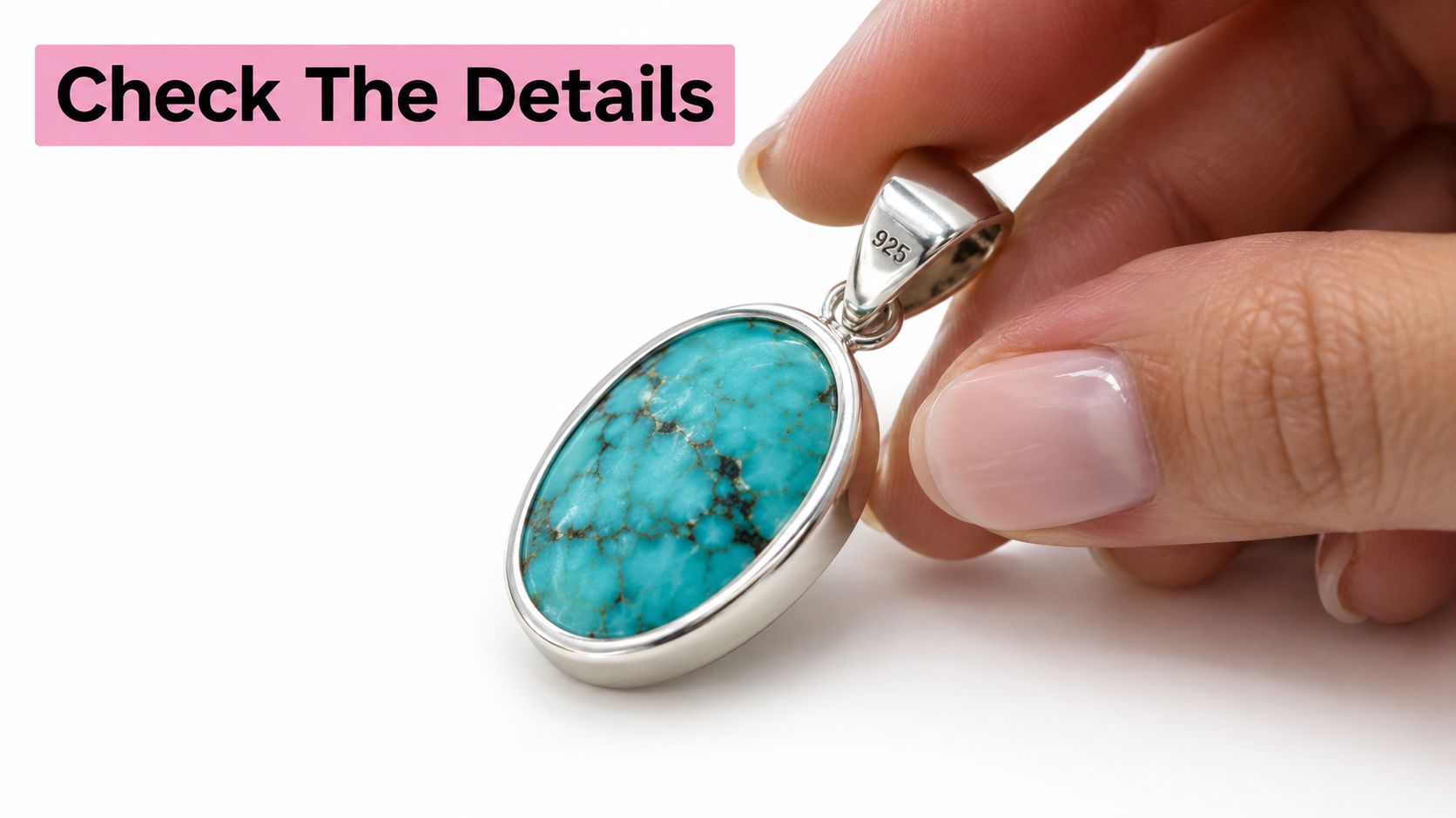 A hand holds a beautiful oval turquoise pendant set in a shiny 925 sterling silver frame.