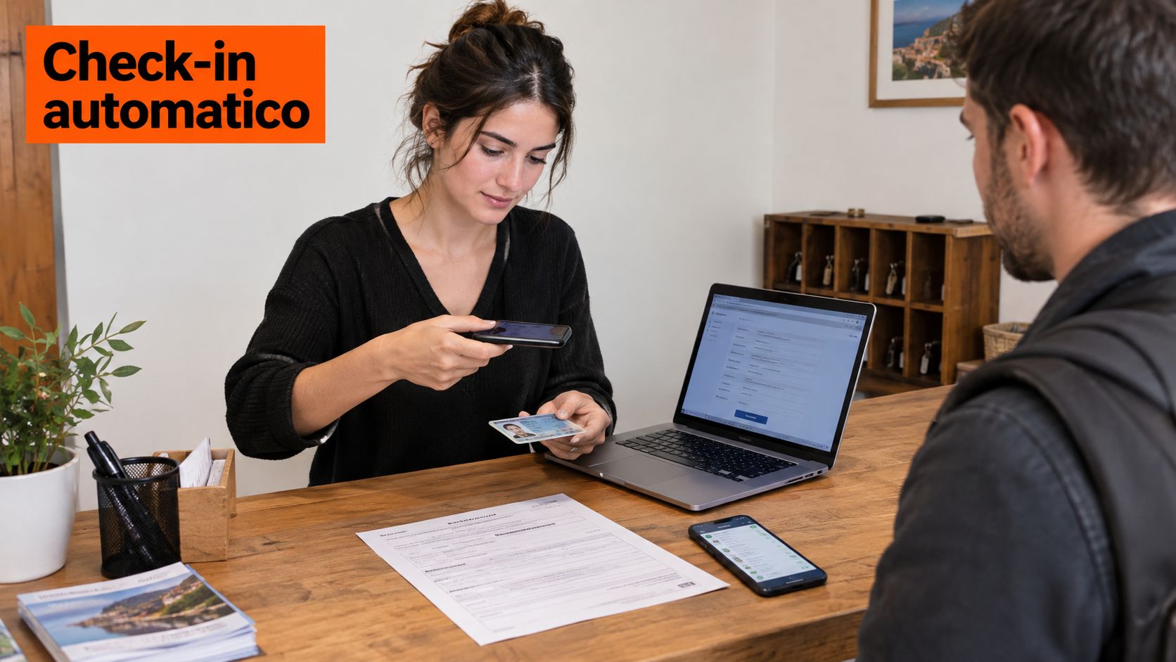 Una receptionist scansiona il documento d'identità di un cliente in una struttura ricettiva moderna.