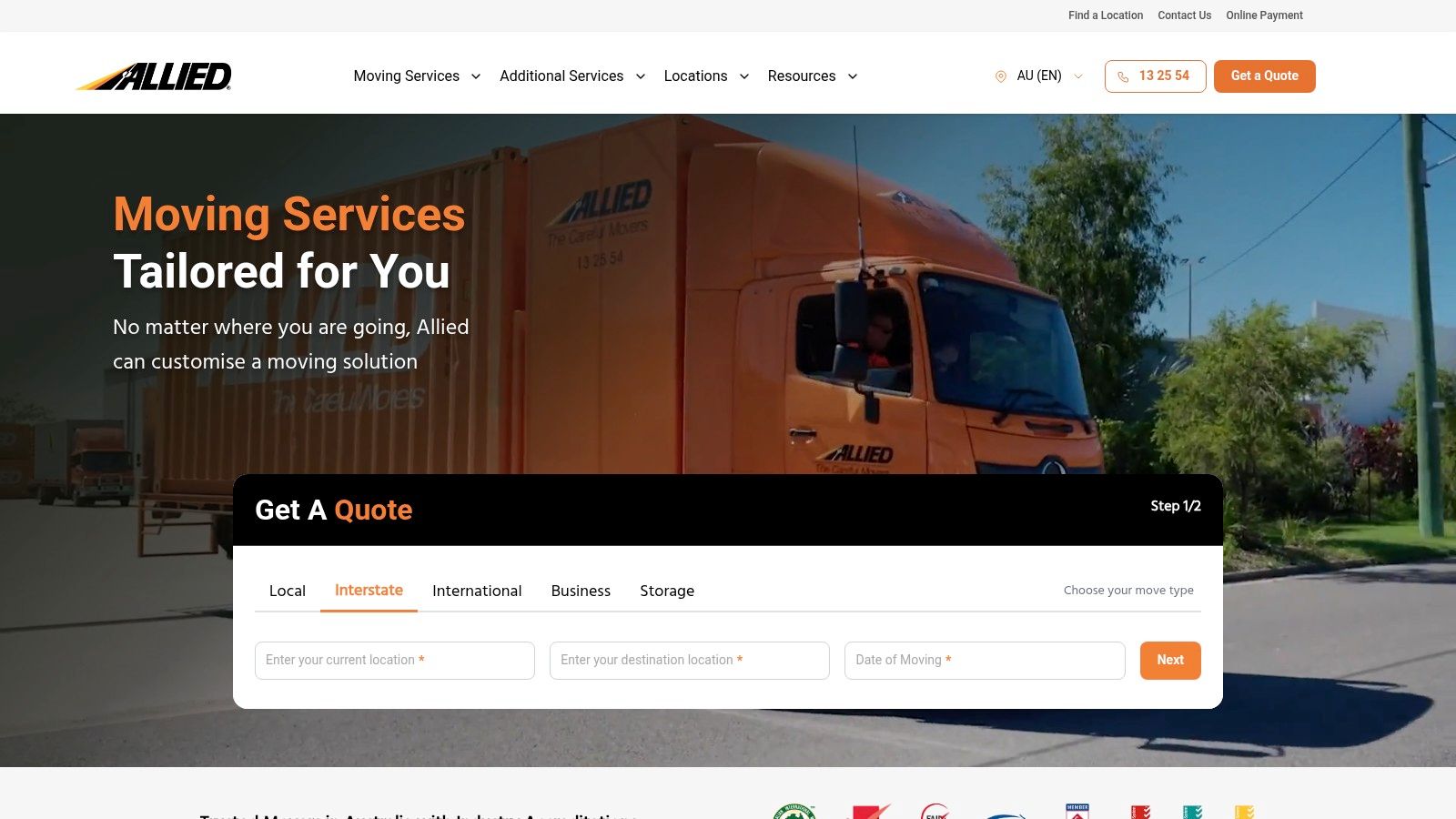Allied Moving Services (formerly Allied Pickfords) truck on a residential street.