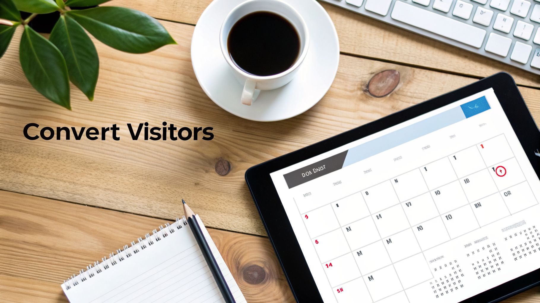 A business workspace with a tablet showing a calendar, coffee, notebook, and "Convert Visitors" text.