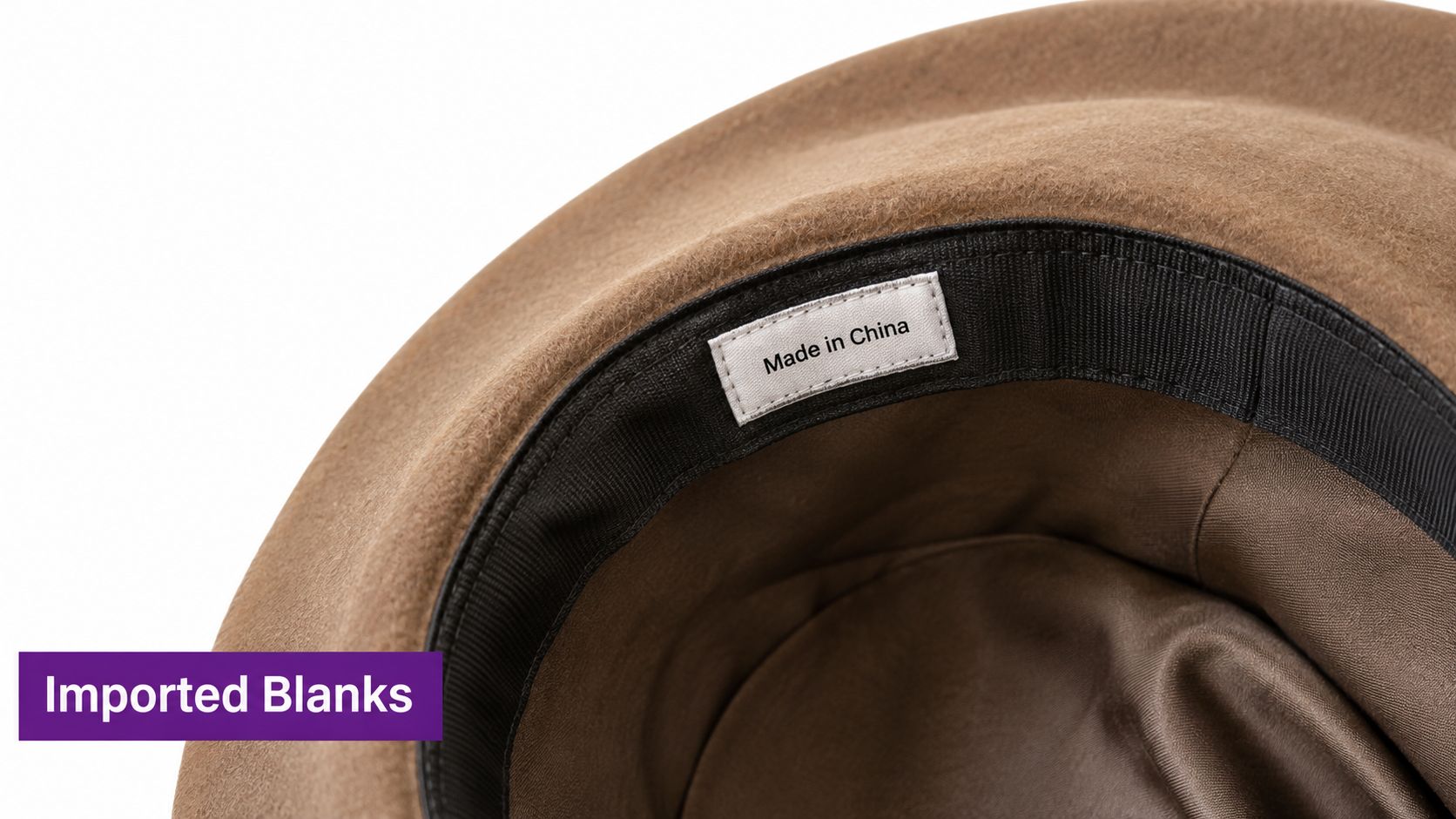 An interior view of a brown felt fedora hat showing a Made in China label inside.