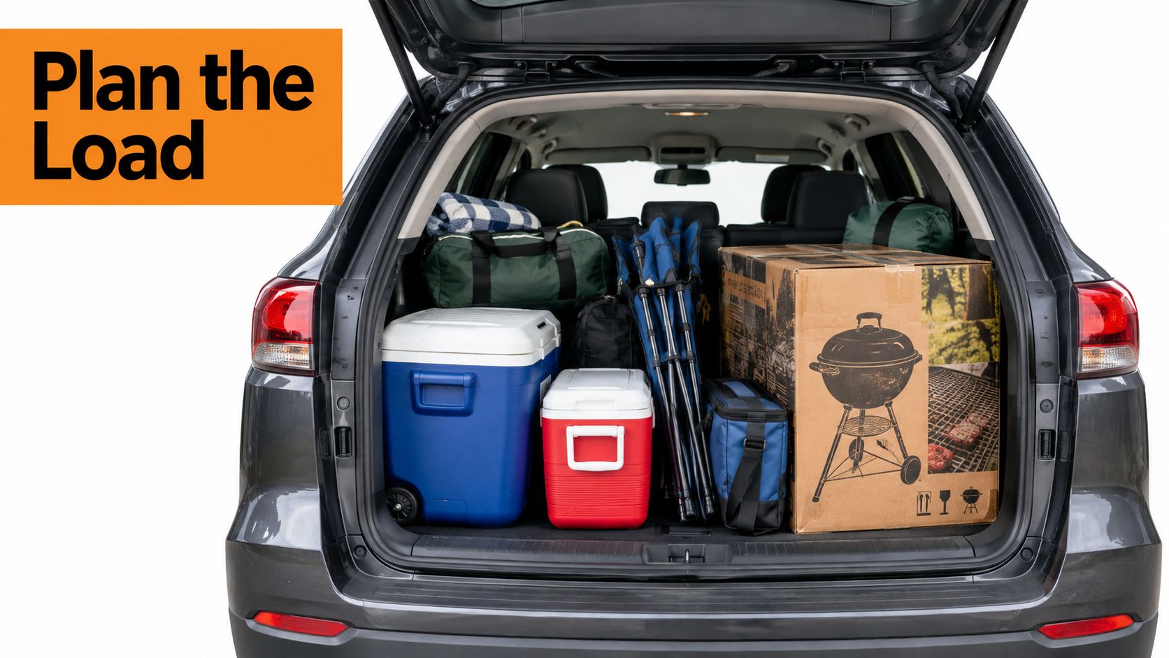 A trunk of a gray SUV packed with camping gear including coolers, chairs, and a grill box.