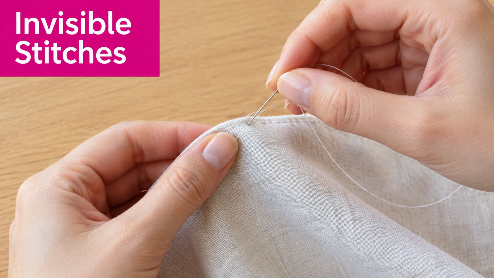 A close-up view of hands using a needle and clear sewing thread for an invisible stitch project.