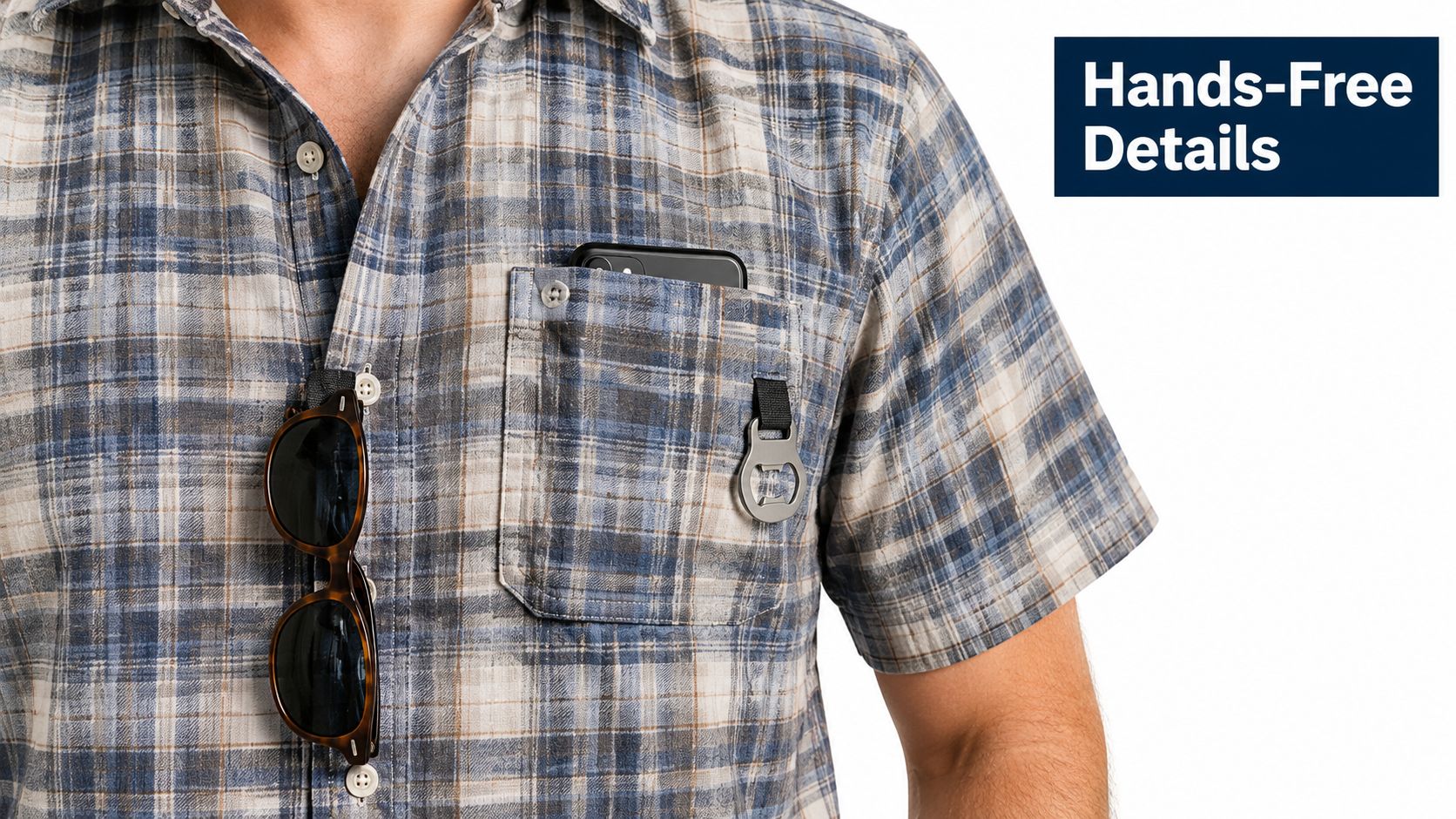 A close up of a man wearing a plaid short sleeve shirt with functional pocket features.