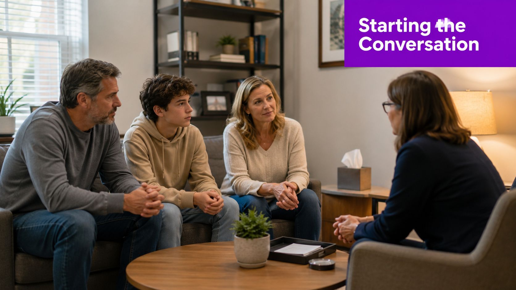 A family and their therapist sitting in a comfortable office setting during a family therapy session.