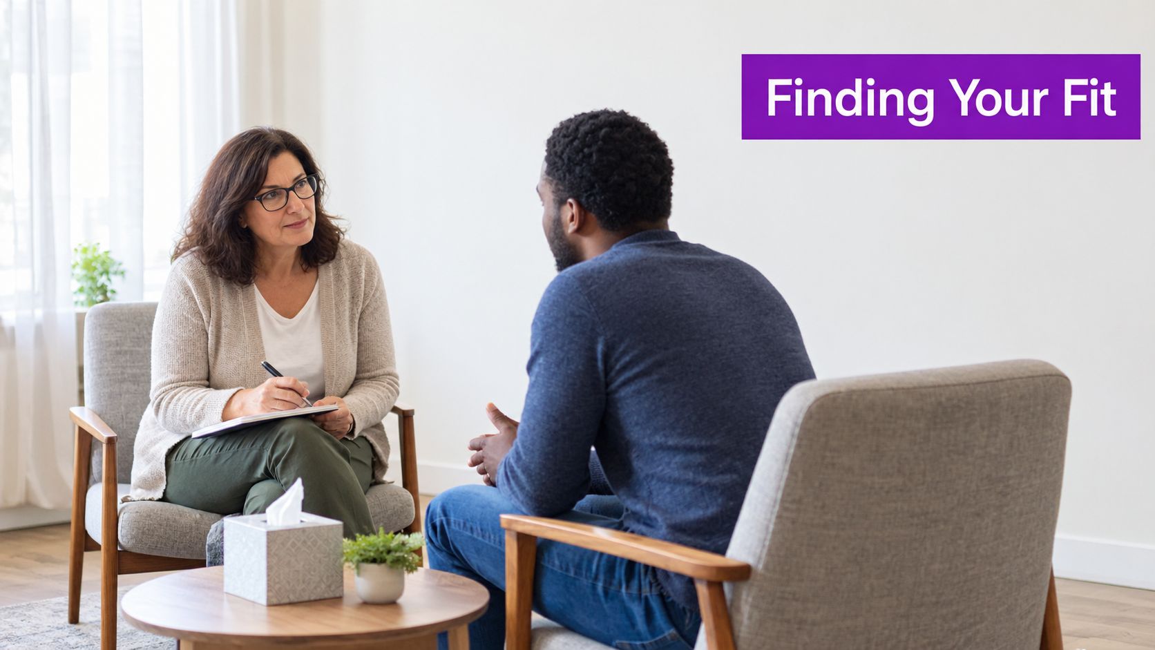 A professional therapist listening to a patient during an EMDR therapy or counseling session in office.