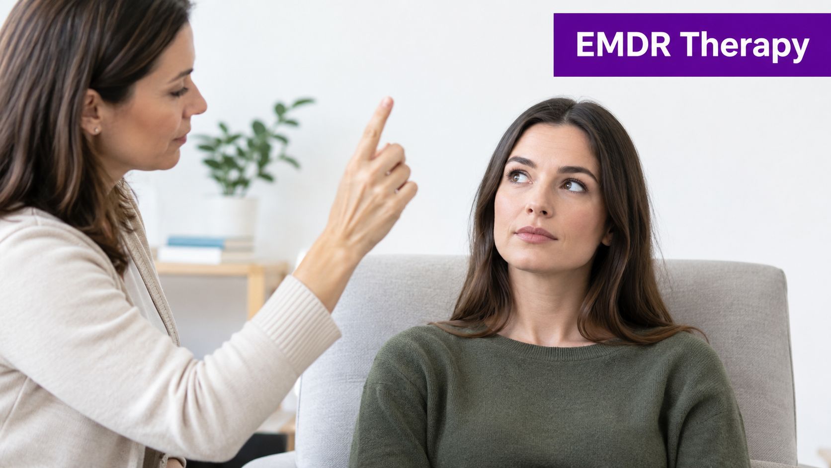 A professional therapist guides a patient through an EMDR therapy session using finger movement techniques.