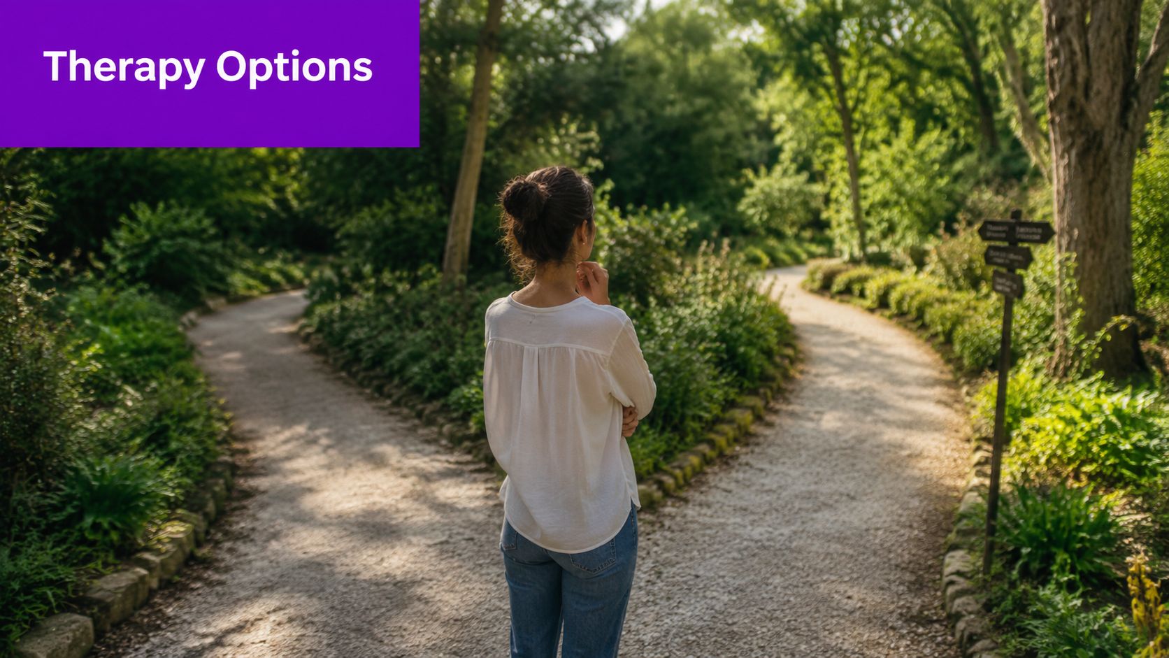 A person standing at a fork in a woodland path, considering different life therapy options.