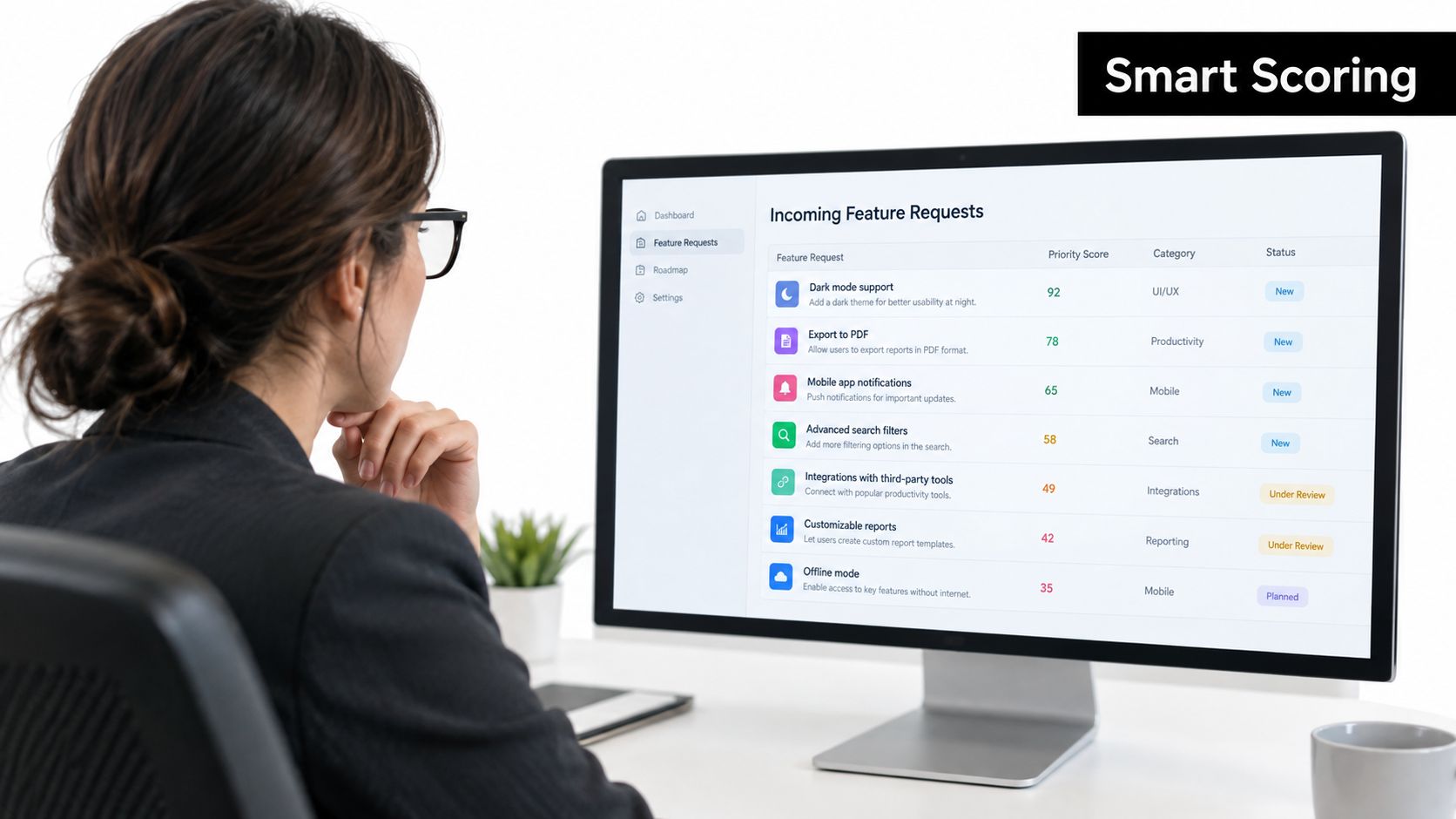 A professional woman looking at a dashboard screen displaying incoming feature requests with priority scores on a computer.