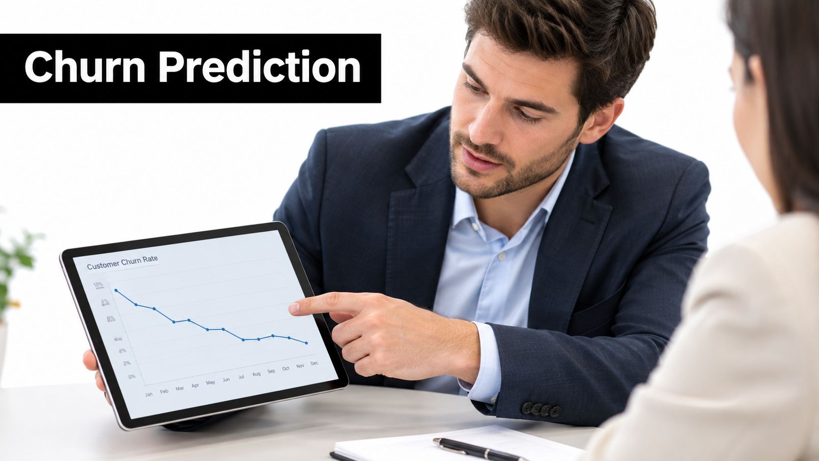A professional man showing data analytics and customer churn rate charts on a tablet to a colleague.