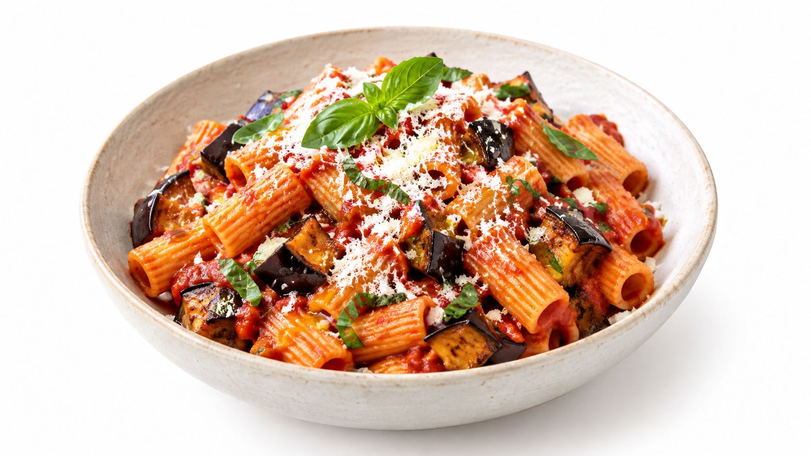 A ceramic bowl filled with pasta alla norma, featuring rigatoni, tomato sauce, fried eggplant, and grated cheese.