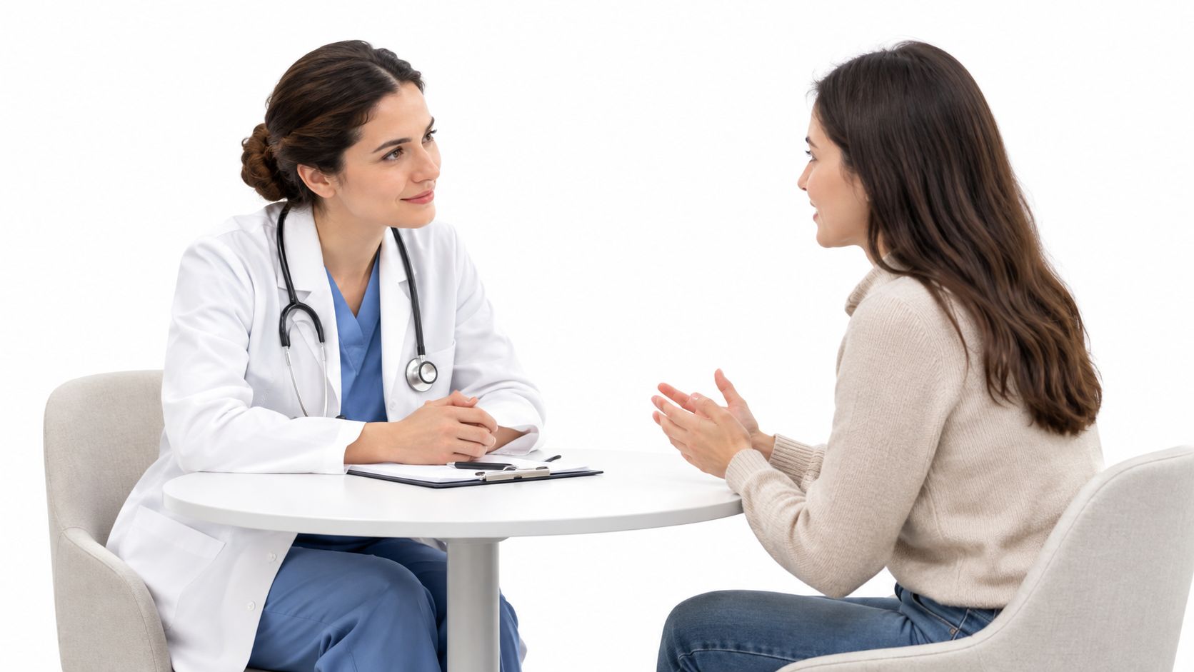 A female doctor in a white coat talking with a patient during a medical consultation.