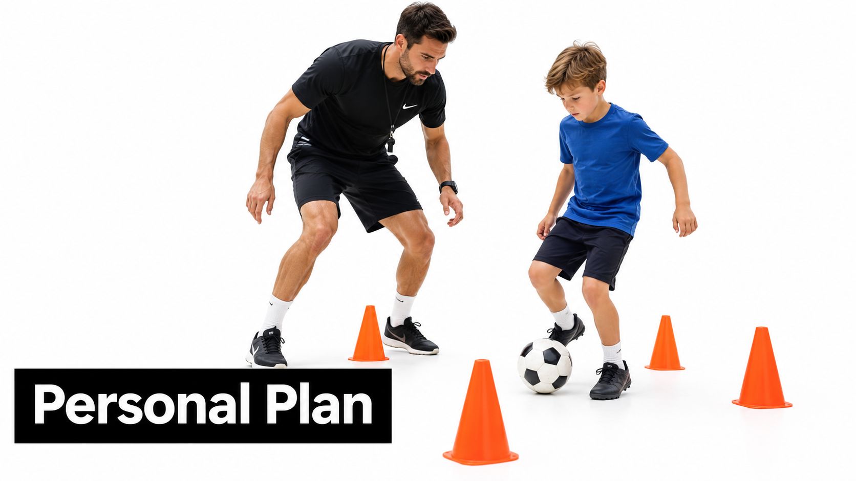 A professional soccer coach guiding a young boy through a dribbling drill around orange plastic cones.