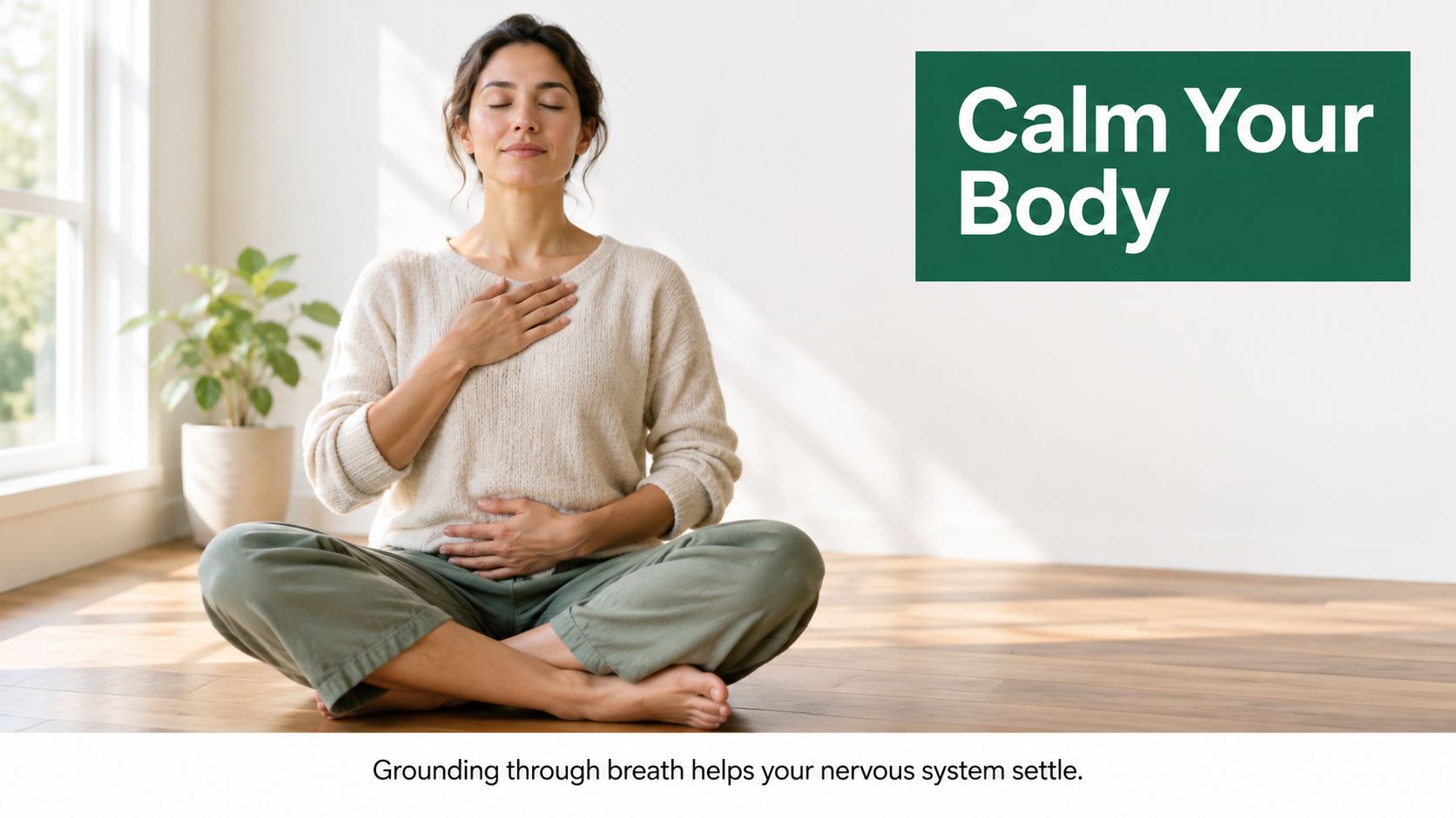 A woman sitting in a meditation pose, practicing deep breathing with hands on her chest and stomach.